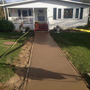 Photo(s) from O Brien Concrete Forms Random stone concrete walkway