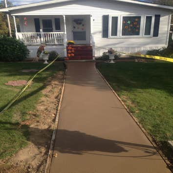 Photo(s) from O Brien Concrete Forms Random stone concrete walkway