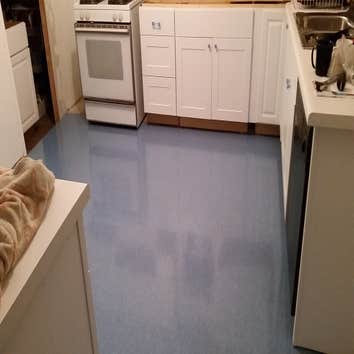 Kitchen Remodel in Dunn barn. Floor was 2-3/4" out of level in 12 feet, required a custom leveling using Ardex K-15 self leveling polymer underlaymen