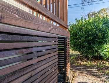 Photos by Homez Remodel #4 Beautiful composite Deck with lightly stained cedar rails and skirts! our team rebuilt this deck in less than 2 weeks!