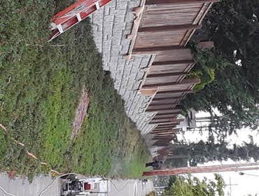 Fence pressure washed and painted