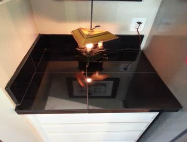 Kitchen Kitchen counter using black polished marble and a subway tile backsplash