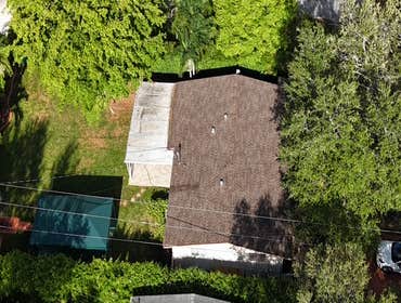 Photos by Gold Star Miami Corp #1 metal roof panels all are . 25 years warrantee