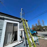 Main Panel Upgrade 200A Main panel upgrade 125A to 200A using bended 2" conduit over gas lines