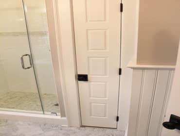 Baine Contracting Inc Project Multiple jobsites - showing kitchens, interior and exterior trim work, new homes, bathrooms, tile work, wood and iron ra