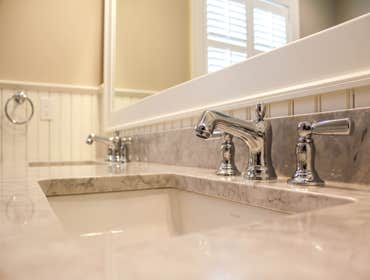 Baine Contracting Inc Project Multiple jobsites - showing kitchens, interior and exterior trim work, new homes, bathrooms, tile work, wood and iron ra