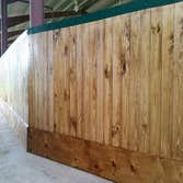 Privacy Fence Give us a call for all your fencing and custom entry needs. (337)532-3227.