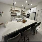 Photos by Luxury Interiors and More #1 granite, marble,quartz slabs for kitchen countertops and bathrooms