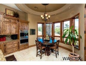 Photos by Sequoia Homes LLC #1 This Tuscan/Mediterranean style home is truly one of Mohave County's finest luxury homes. Over 1 acre of property in the