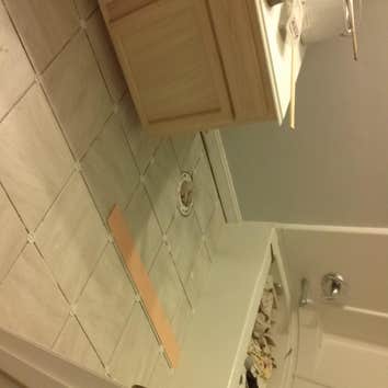 Remodel bathroom Demo floor and replaced floor joists
New subfloor
New tile
New cabinet