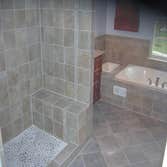 Complete Bathroom Remodel This bathroom was completely remodeled. A custom shower was built with a seat added.