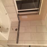 Up Stairs Bathroom Tile Beutiful Desing of tile on the ground and wall all around.