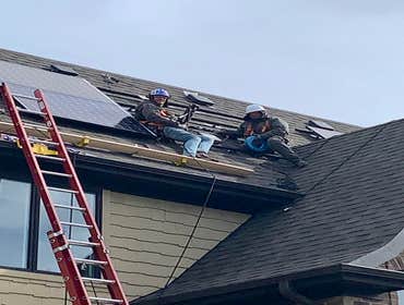 Photos by Rethink Electric Solar installation on a steep roof