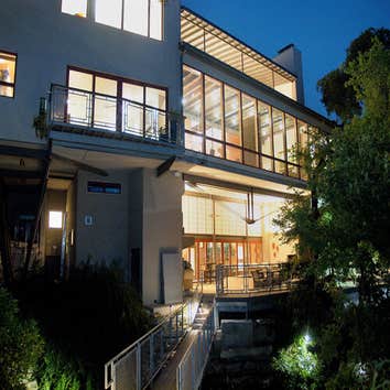Landa Residence This striking modern structure is constructed of steel, concrete, and glass with warm white oak wood and Texas buff-leuder stone interi