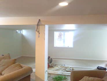 Basement remodel This basement was completely redone. We added windows by cutting through the 10in thick concrete. We build all new walls, hard-rocked 