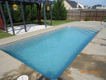 Thompson Pool This is a pool we maintain on a weekly basis. It is just beautiful and ready for a swim!