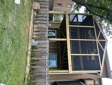Screened in porch and patio Screened porch and paved patio