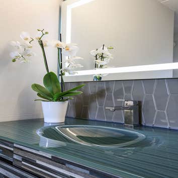 Tile Backsplash and glass vanity counter