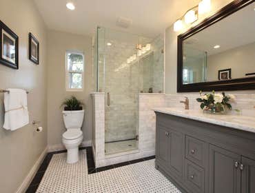 Frame-less enclosed shower