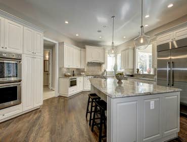 GULICK | CUSTOM Home in McLean The impressive stone and HardiePlank® elevation on our Winthrop really stood out on this corner lot of approximately one