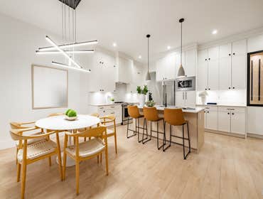 Santa Clara- Kitchen remodel This project included a full kitchen remodel with an open-concept layout. We installed custom white cabinetry, a large cen