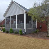 Screen porch and roof addition Removed old deck. Built new roof and composite deck. Installed high end aluminum screen room enclosure