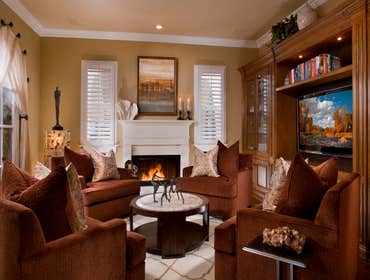 Custom Fireplaces in Los Angeles and Woodland Hills, California. These custom built fireplaces with raised paneling, applied moldings, and painted whi