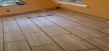 Tile job 2019 Kitchen floor remodel was vinyl to tile.