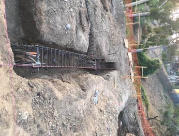 Mount Washinton Hillside land development including caissons/piles, grade beams, CMU block walls, retaining walls. All known as foundation and structur