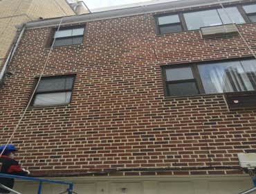 Photos by S.M. Construction USA Inc. #4 We did masonry repointing on the front and back side of the property. We also changed window litels, did caulki