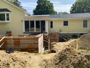 Photos by Kmas Construction Group #2 New family room addition, building new half bathroom, remodel master bathroom and small bathroom. New entry porch,