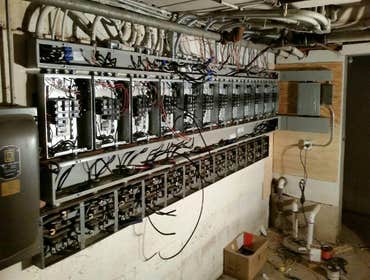 Photos from Paul's Electric Upgrade 26 panels from fuses to circuit breakers