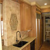 T L Renovations Kitchen upgrade Refinished all the woodwork throughout entire house, we put in new tile and countertops removed drop down ceiling and 