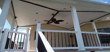 A Covered Pergola This is one of our raised decks that we built. Note that it has both a pergola and a covered deck area, we're proud of this beautiful
