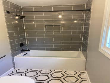 Photos by A& N Developments LLC #1 The project includes a complete remodel of the existing bathroom. Work will involve demolition and removal of existi