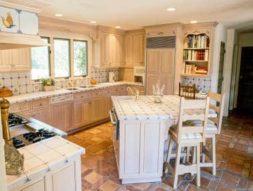 1991: English Styled Kitchen This client loved the English Styled look of Limed Oak, Frieze Details, and Beaded Inset Doors made popular at the time in