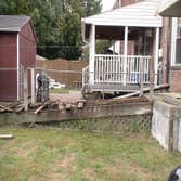 Handicap Ramp Project required the removal of an existing ramp and railing which than was replaced with the construction of a new ramp and railing. Als