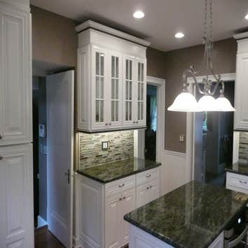 KITCHEN #1 This was a total kitchen remodel in a 100 year old house. Included was:
-Hardwood flooring
-Electrical service upgrade
-Under cabinet an