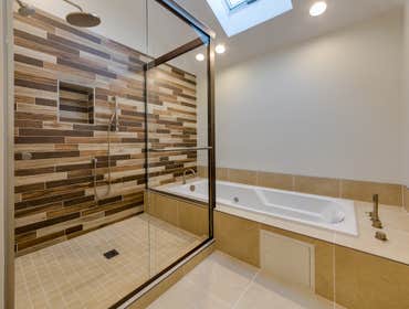 Brown Mosaic Tile Bathroom Remodel This bright contemporary bathroom remodel was recently completed by the Goodfellas Construction team. Our client ch