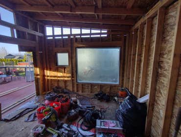 Photos by Stewart & Son Gate & Fence LLC #1 Tiny House with pergola. Small house 17' by 12' small bathroom with pocket door, and small sink with water 