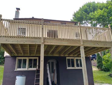 Photos by Canady Construction & Home Improvement #1 10x20 Deck with sliding glass door addition