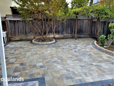 Almaden Valley Paver Stone Patio A gorgeous paver stone patio turns this home's lawn into a functional outdoor space. Adding some light landscaping aro