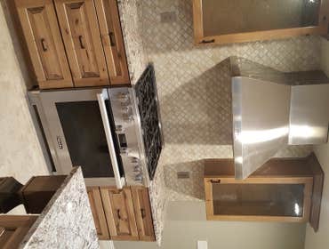 Photos by Beyond Basics Construction #1 New kitchen, 2 new bathrooms remodels, add 1 new bathroom, new HVAC, water heater, changed all lighting,doors a