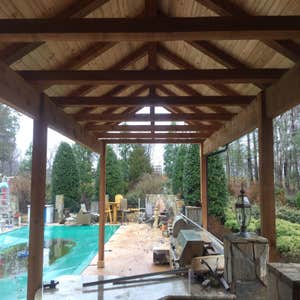 Photo(s) from Portante Clan Construction Llc Outdoor covered timber frame kitchen cover.