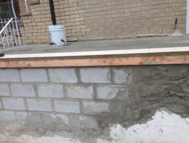 Outside work pavers, addition and siding. Photos of outside work. Back yard pavers