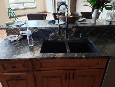 Photos by North Country Construction Inc #1 We built this gorgeous 5,000 SF house for a client in the powderhorn. It has a attached 3 car garage on a n