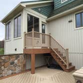 Trex deck NEPA New Trex Deck herringbone design and cultured stone wall.
