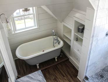 Baine Contracting Inc Project Multiple jobsites - showing kitchens, interior and exterior trim work, new homes, bathrooms, tile work, wood and iron ra