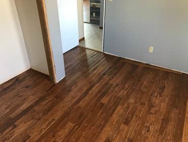 Beautiful new flooring and a happy customer! Beautiful new flooring and a happy customer!