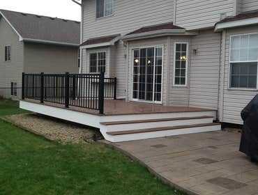 Photos by Custom Home Specialties Inc #2 Timber Tech maintenance free decks with powder coated railings.